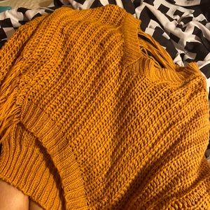 It’s a sweater you can put a tank top under